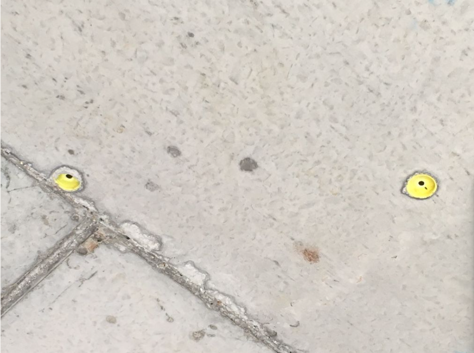 scissorsafe anchor points exposed in concrete