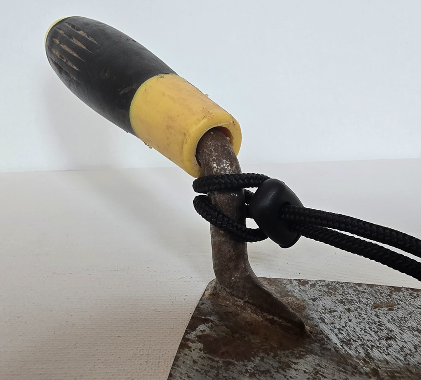 TOOL LANYARD ON BRICKLAYERS TROWEL